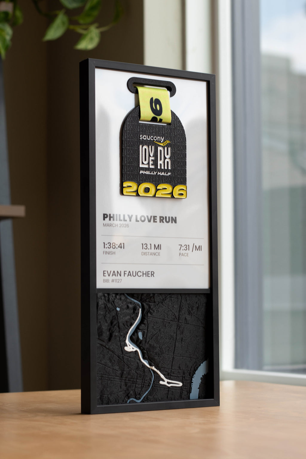Example Bonk Studios race panel: finisher medal, stat sheet and a 3D relief map of the course in a black frame