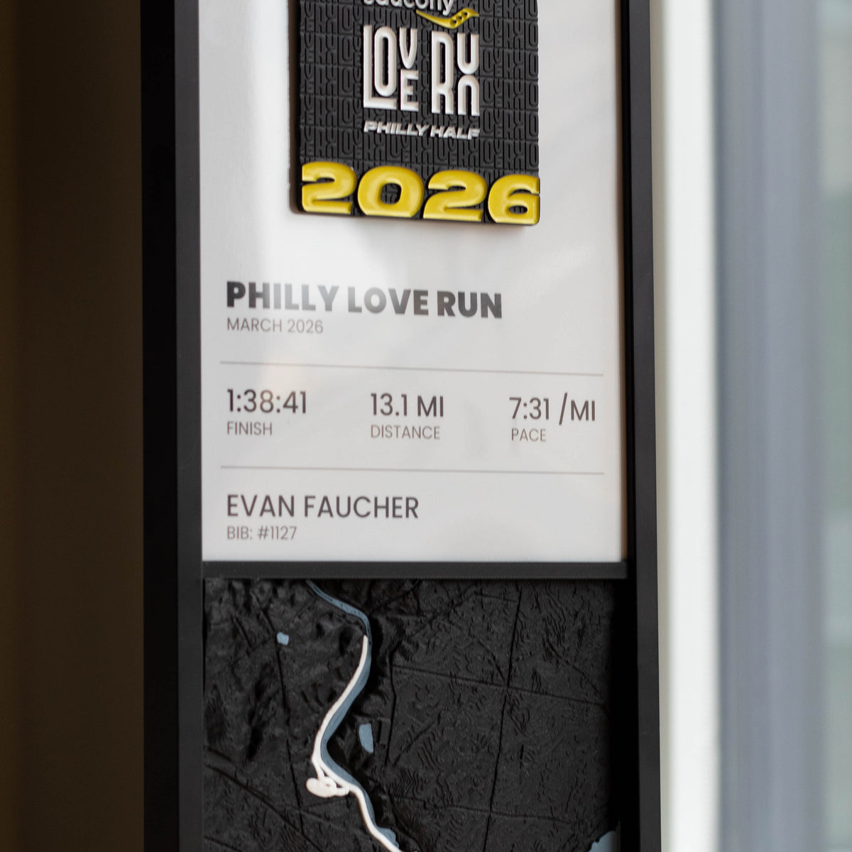 Example Bonk Studios race panel: finisher medal, stat sheet and a 3D relief map of the course in a black frame